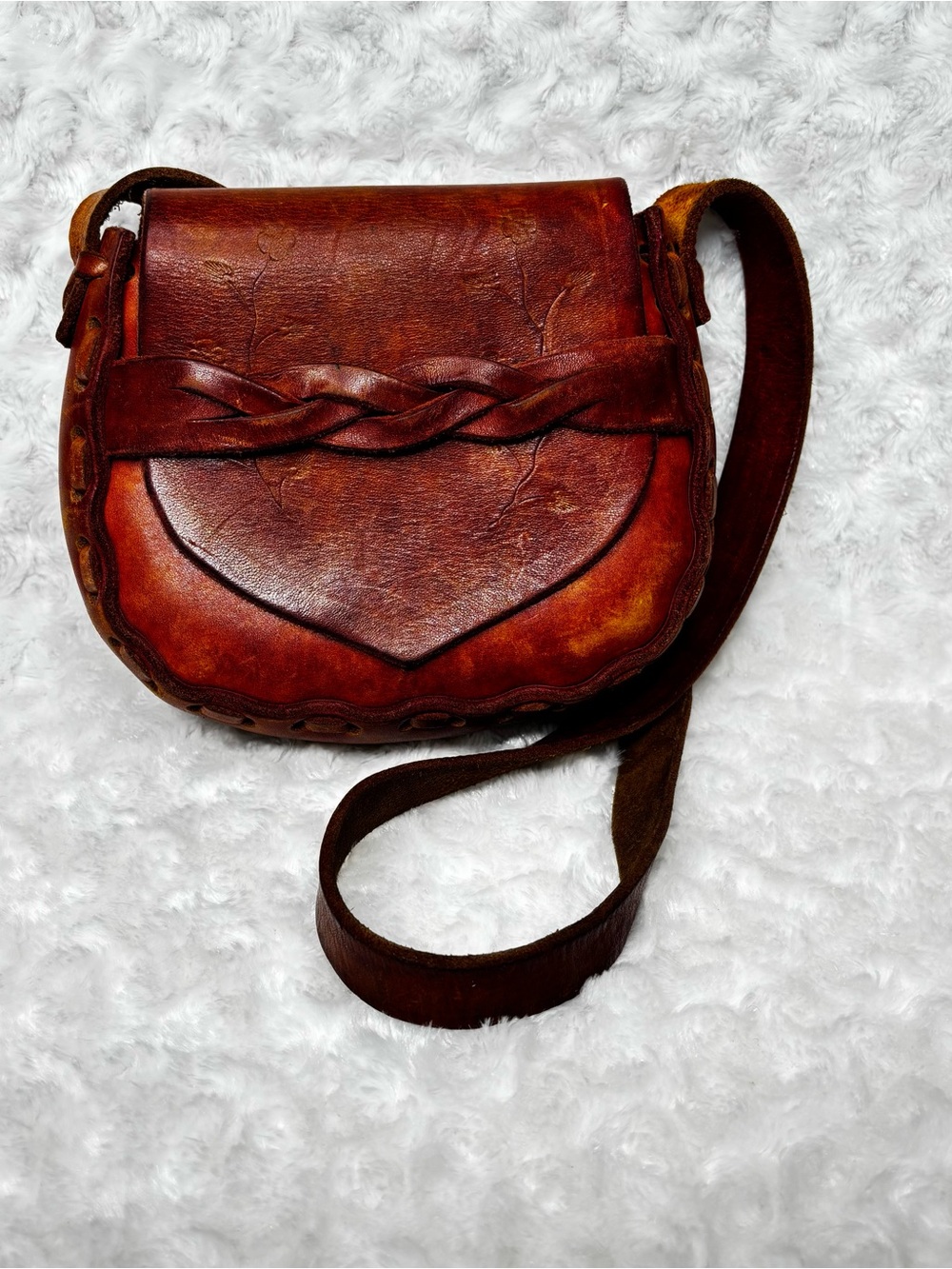 Vintage 1970s hand-tooled brown leather Boho shoulder bag with flap closure